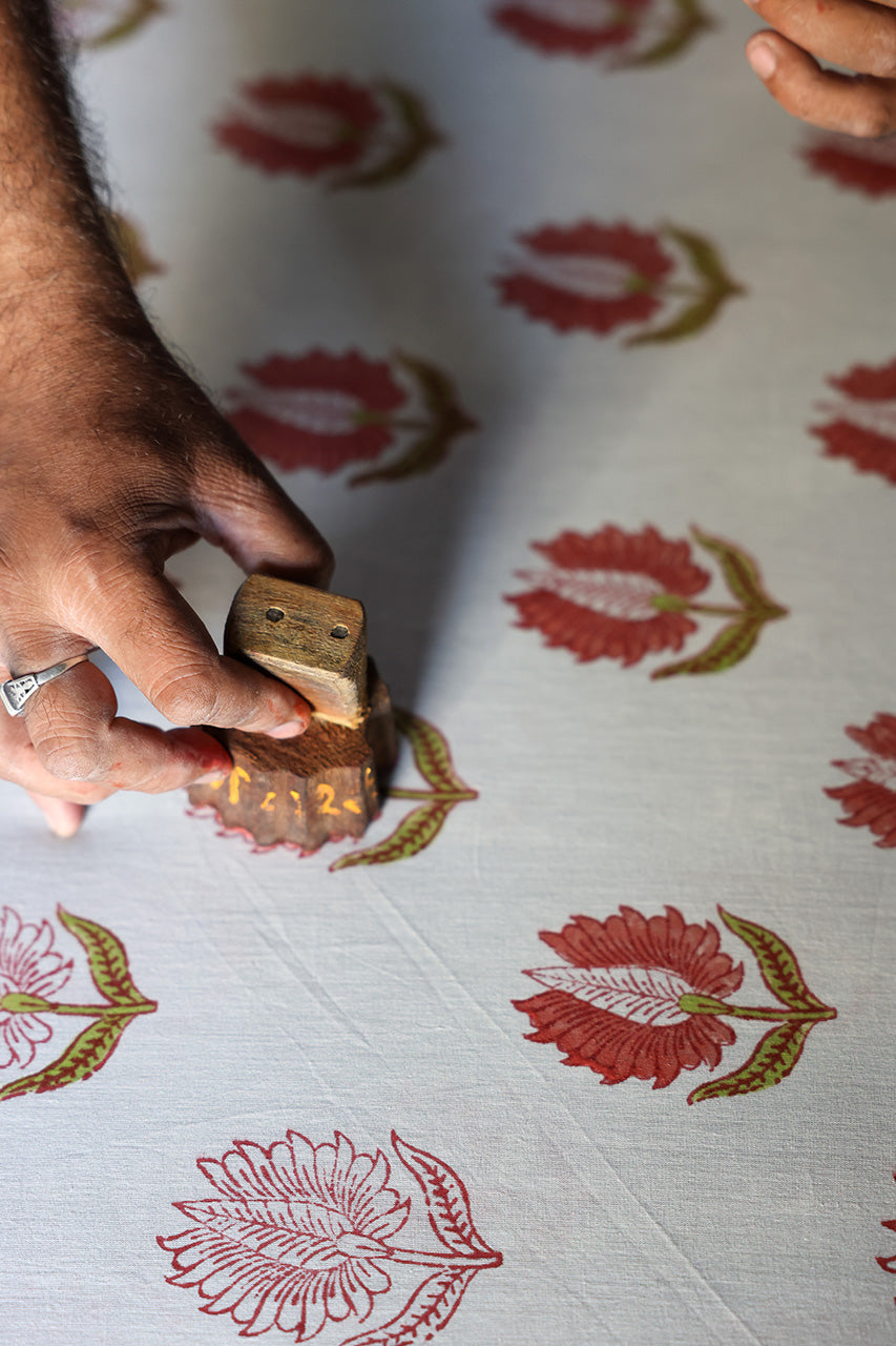 Ria Mini Dress Strawberry Cream — artisan fabric detail, strawberry cream hand block print cotton with pink floral botanical motif close-up, traditional Sanganer Jaipur block printing craft India | Daughters of India