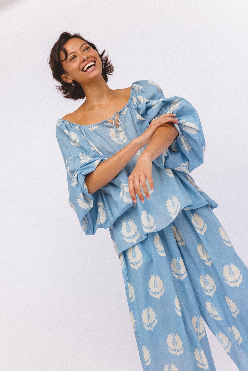 Ria Blouse Sky — upper body studio portrait, showcasing blouse detail, sky blue hand block print cotton, sustainable Indian fashion artisan | Daughters of India